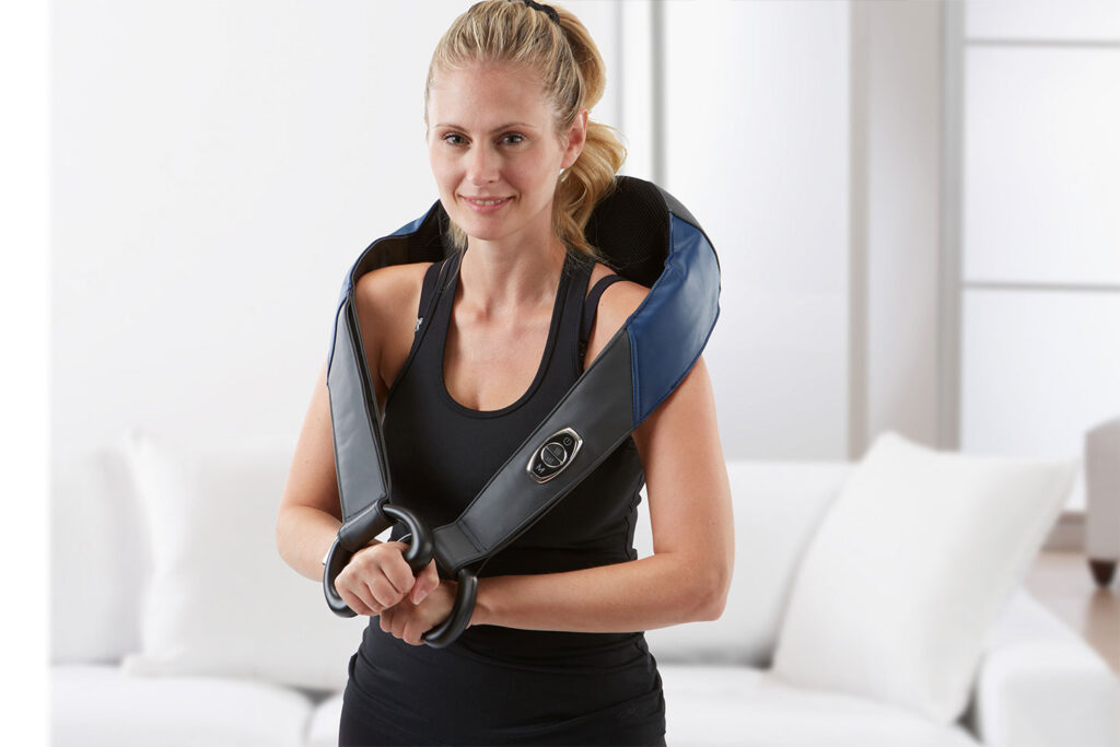 Person enjoying their shoulder massager from LAIDBACK.